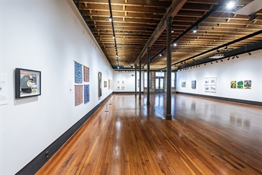 Open room displaying the Resilient and Responsive exhibition.