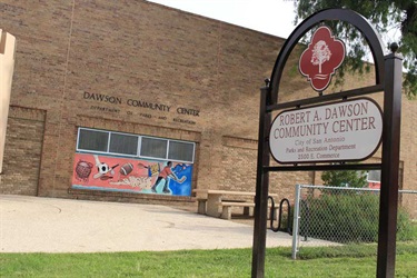 Dawson Community Center Sign in front of brick building