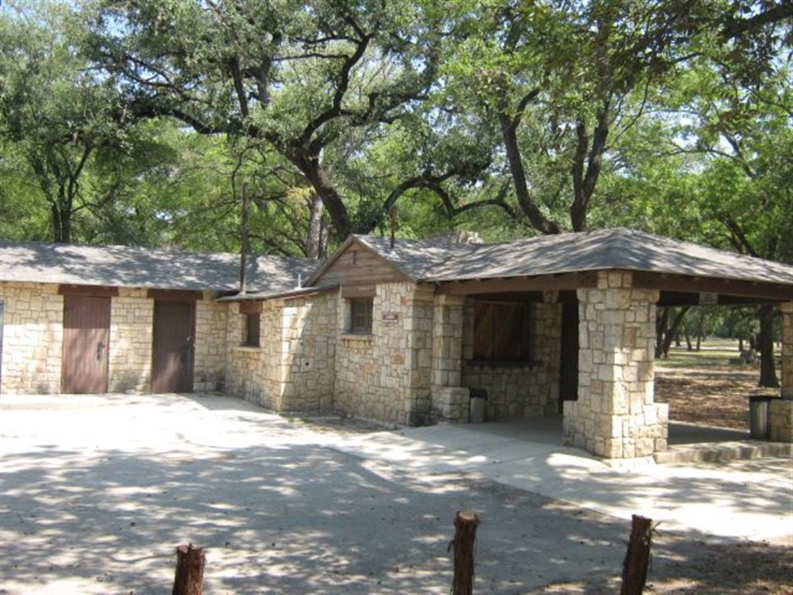 Stone building surrounded by trees