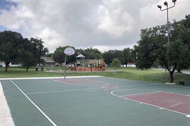 Kenwood Park basketball court, light fixture and playground